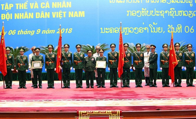 Nhà nước Lào vinh danh Quân đội nhân dân Việt Nam - ảnh 1