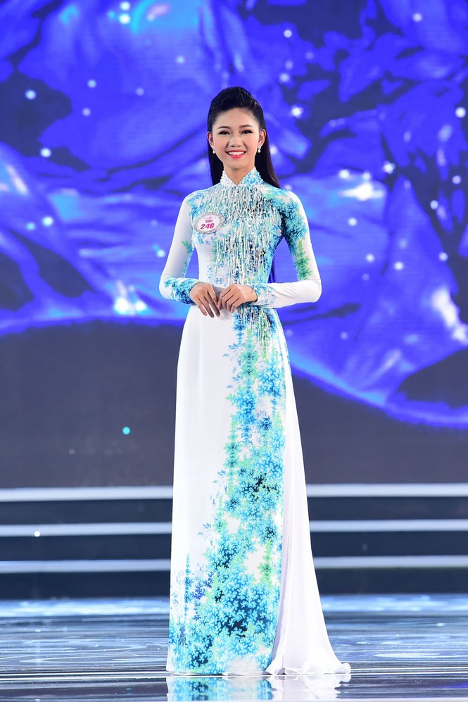 Hoa hậu Việt Nam tỏa sáng trong tà áo dài Thái Tuấn - ảnh 4