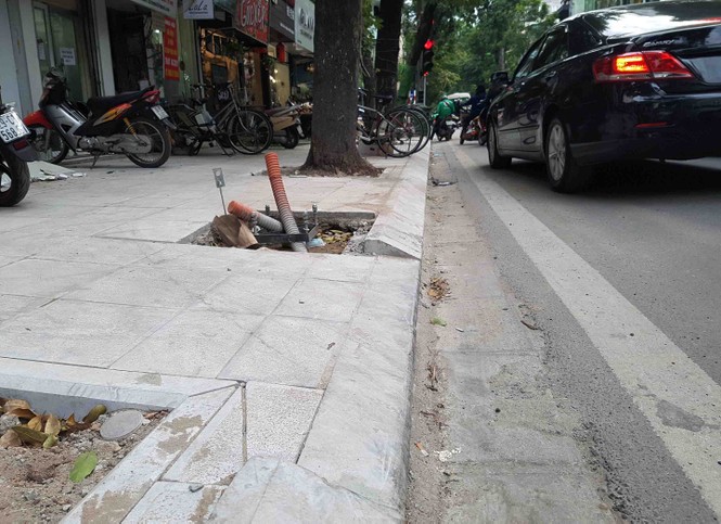 Vỉa hè lát đá tự nhiên tiền tỷ “uốn lượn mềm mại” - ảnh 10