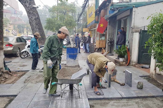 Chưa công bố kết luận thanh tra, Hà Nội lại lát vỉa hè bằng đá tự nhiên - ảnh 9