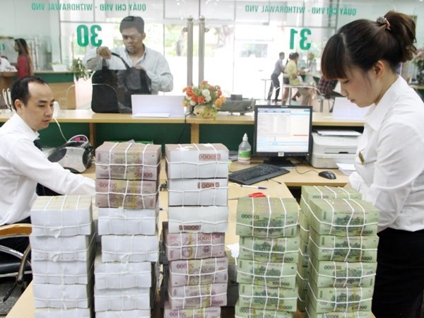 Đồng loạt giảm lãi suất tiền gửi và cho vay ngắn hạn - ảnh 1