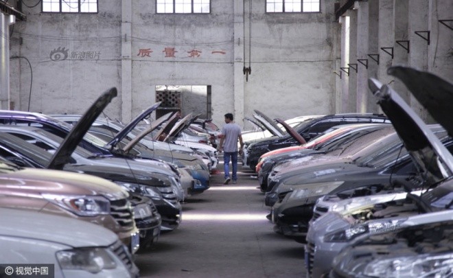 Đấu giá xe bị ngập nước mùa mưa ở Trung Quốc - ảnh 1