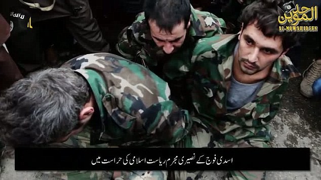 IS sát hại dã man tù binh Syria rồi kéo lê xác trên đường phố - ảnh 3