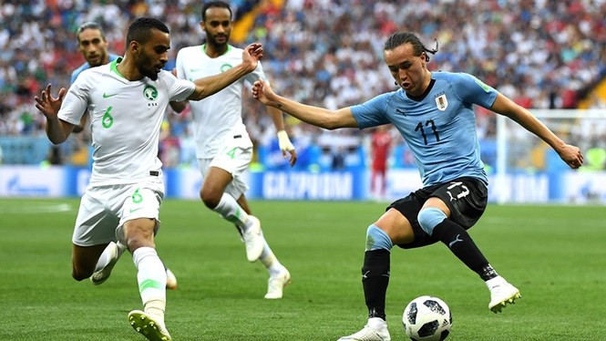 Suarez lập công, Uruguay sớm lấy vé vòng 1/8 World Cup - ảnh 16