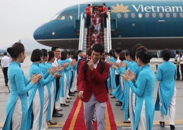 Olympic Việt Nam đã về tới sân bay Nội Bài - ảnh 19