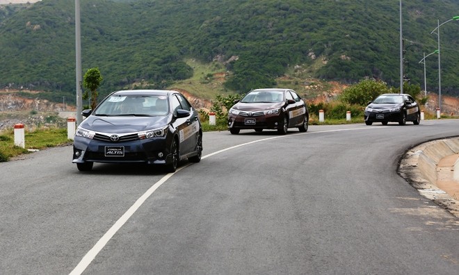 Toyota Corolla Altis 2014 có giữ được 'ngôi vương'? - ảnh 1
