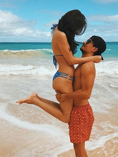 Hoa hậu Hoàn vũ diện bikini nóng bỏng bên bạn trai mới - ảnh 1