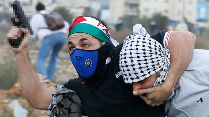 An ninh Israel thâm nhập đoàn biểu tình Palestine, khống chế phần tử quá khích - ảnh 1