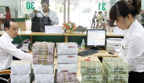 Lãi kỷ lục trăm triệu USD và cơn đau đầu của đại gia ngân hàng - ảnh 2
