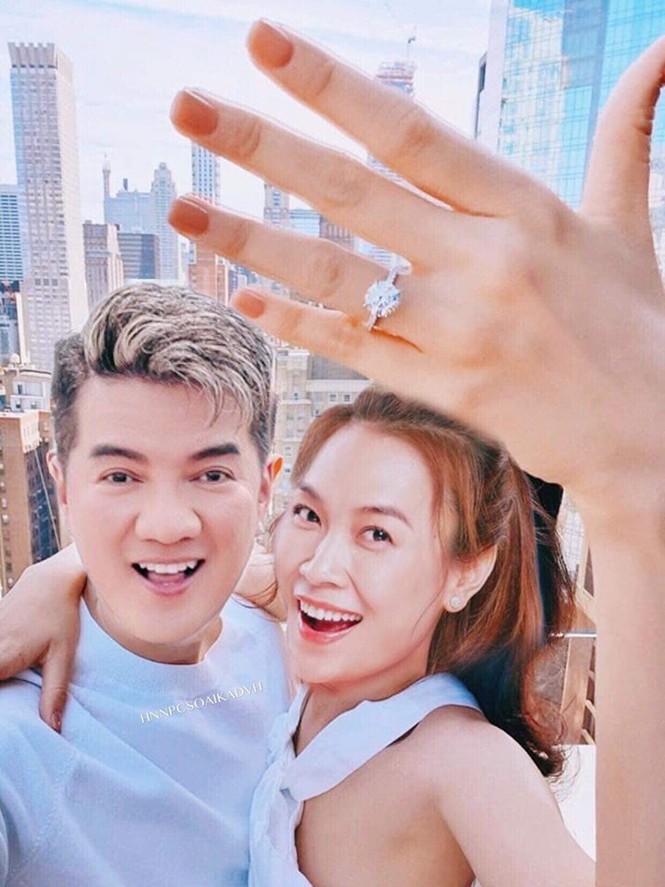 Sự thật về bức ảnh Mỹ Tâm đồng ý lời cầu hôn của Đàm Vĩnh Hưng? - ảnh 1