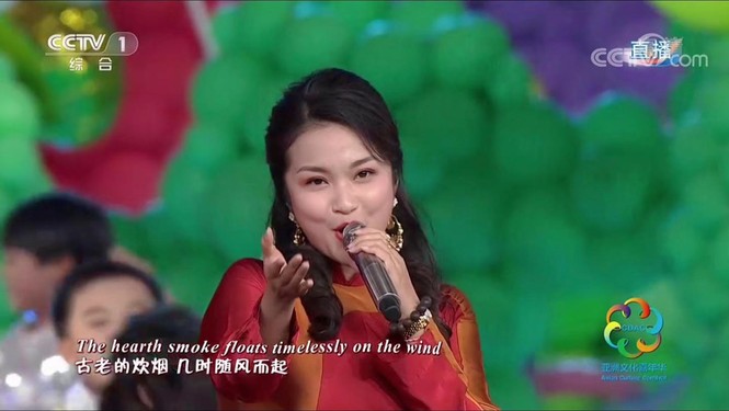 Tố Hoa hát cùng Bi Rain và Thành Long trên sân khấu Bắc Kinh - ảnh 1