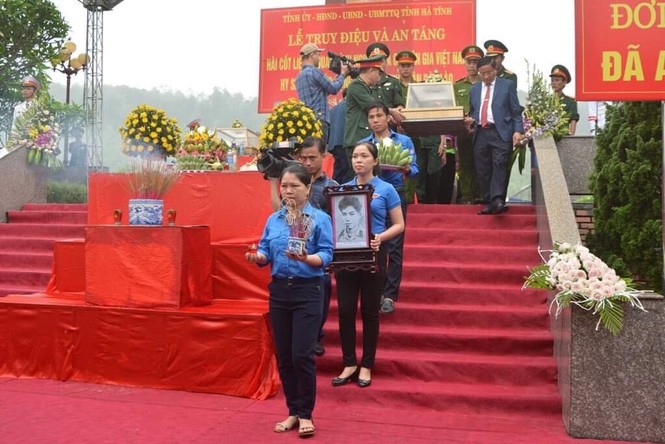 An táng 7 hài cốt liệt sỹ hy sinh ở Lào - ảnh 2