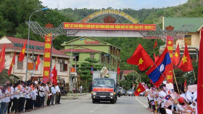 Lễ rước 107 hài cốt liệt sỹ hy sinh tại Lào về nước - ảnh 1