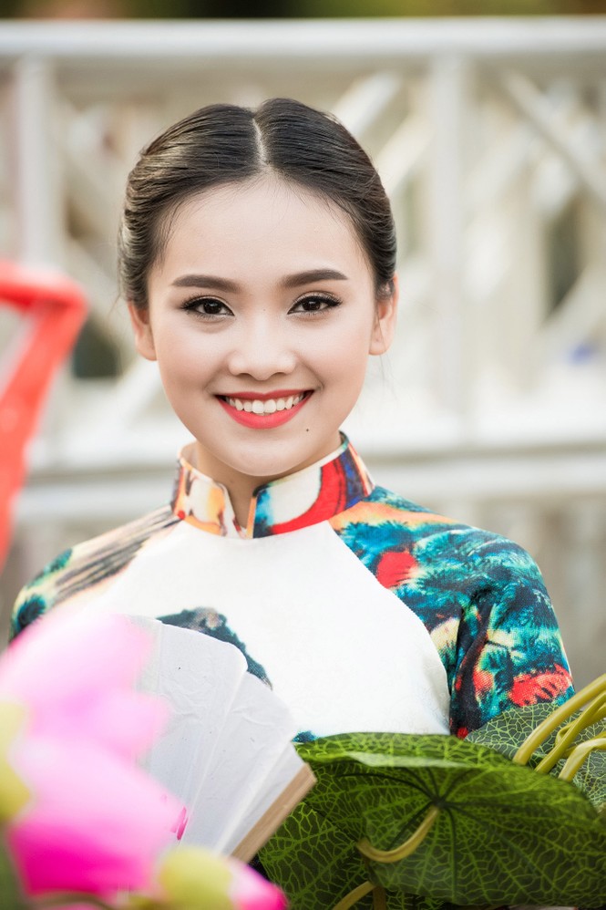 Dàn người đẹp HHVN 2016 diễu hành trên phố với áo dài - ảnh 9