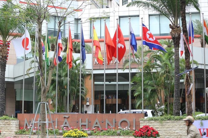 Đoàn xe chở nhân viên an ninh Triều Tiên về khách sạn Melia Hà Nội - ảnh 9