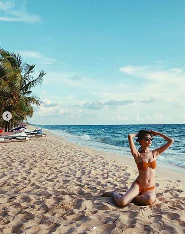 Á hậu Thuỳ Dung khiến fans xúyt xoa với loạt ảnh bikini nóng bỏng trên biển - ảnh 2