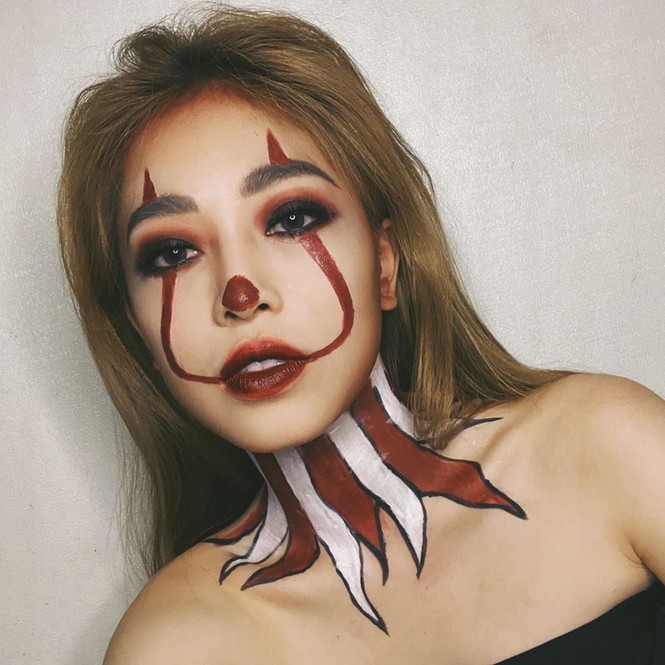Mừng Halloween, Hoàng Thuỳ 'chơi lớn' mặc trang phục dân tộc bằng lá chuối - ảnh 4
