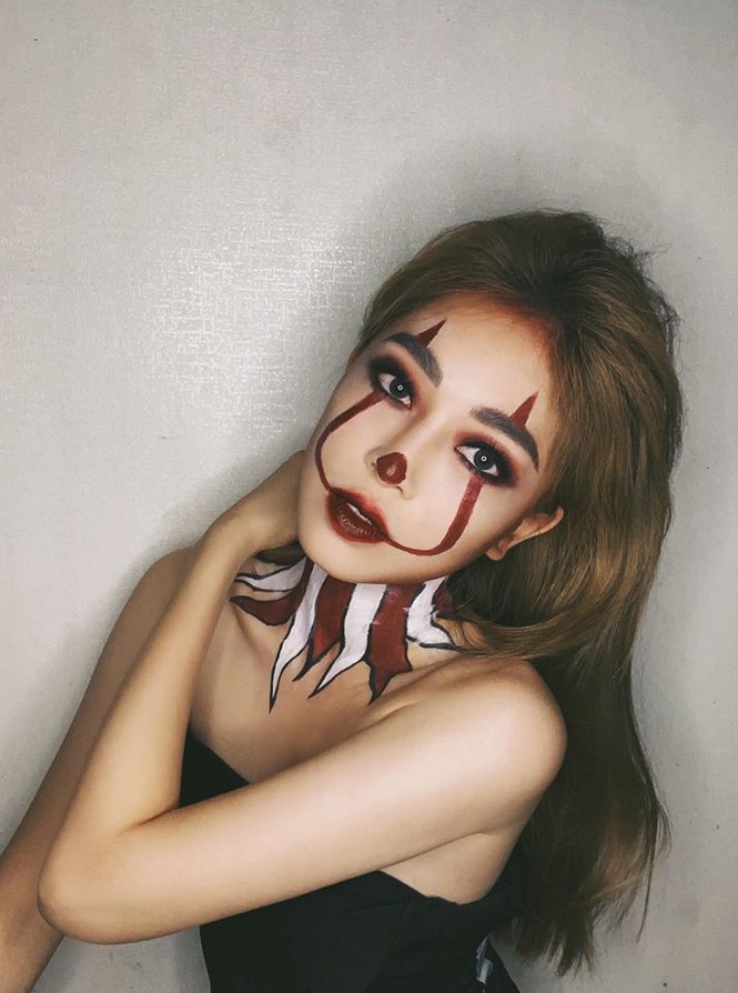 Mừng Halloween, Hoàng Thuỳ 'chơi lớn' mặc trang phục dân tộc bằng lá chuối - ảnh 5