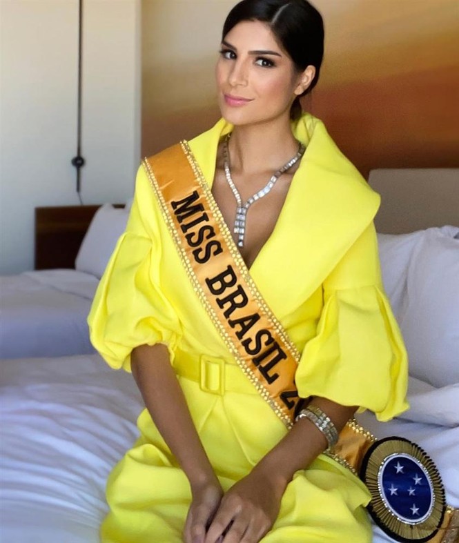 Hoàng Thuỳ mặc áo hồng nổi bật, lấn át dàn thí sinh trong ngày đầu Miss Universe - ảnh 12