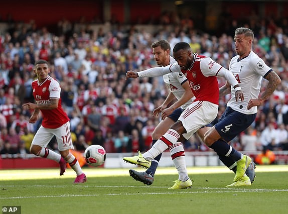 VAR 'lên tiếng', Arsenal chia điểm với Tottenham - ảnh 12