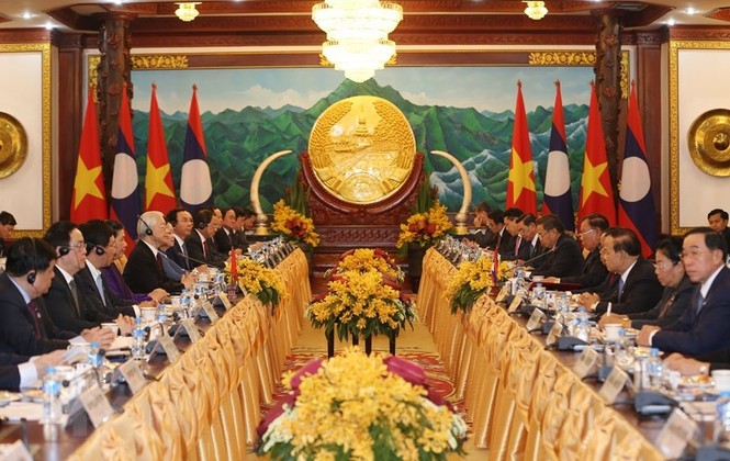 Hình ảnh lễ đón và hội đàm giữa lãnh đạo hai nước Việt Nam-Lào - ảnh 4