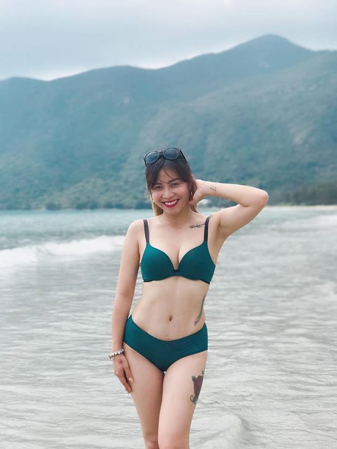 BTV Hoàng Linh lại tung ảnh bikini 'đốt mắt' người nhìn - ảnh 7