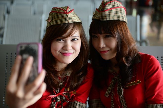 Tiếp viên Vietjet Air gợi cảm trước giờ bay - ảnh 9