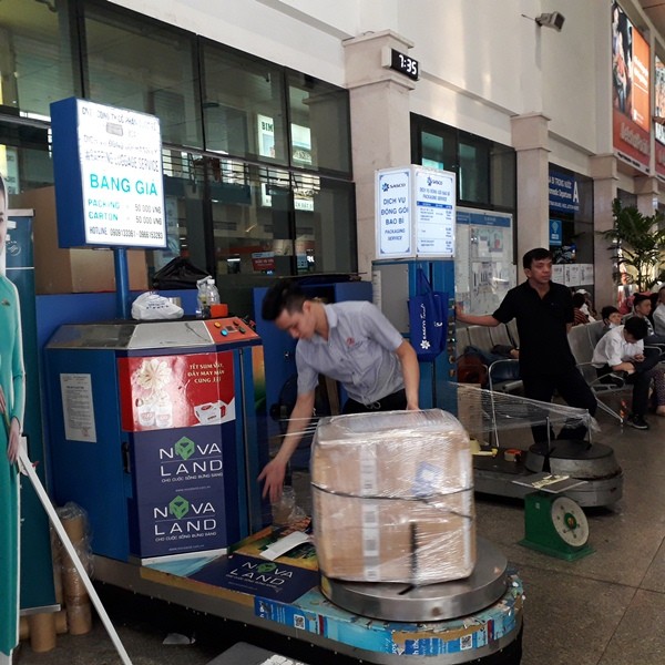 Sân bay Tân Sơn Nhất thông thoáng sáng 29 Tết - ảnh 13