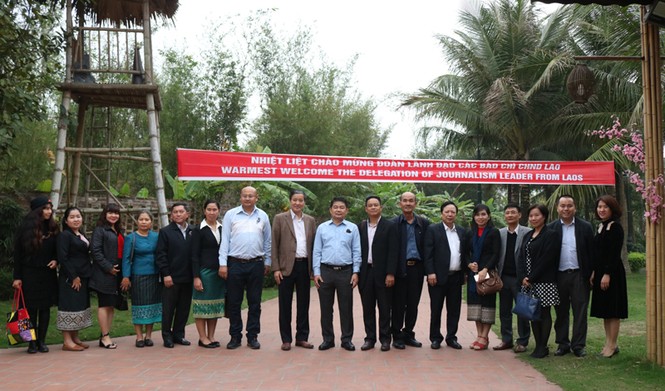 Đoàn lãnh đạo các cơ quan báo chí Lào thăm và làm việc tại Báo Xây dựng - ảnh 5