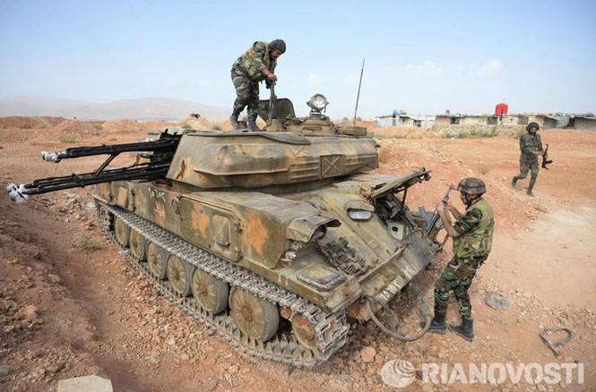 Cận cảnh cuộc sống binh sỹ Syria ở tiền tuyến - ảnh 5