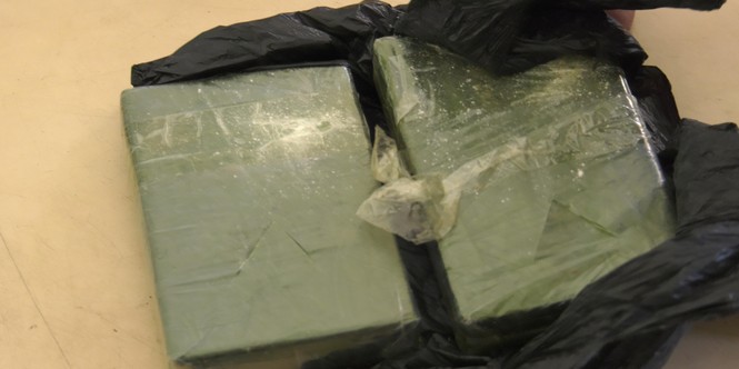 Người đàn ông 'đút túi' 2 triệu để vận chuyển thuê 2 bánh heroin - ảnh 1