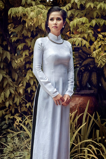 Thảo Trang đằm thắm với áo dài trắng - ảnh 8