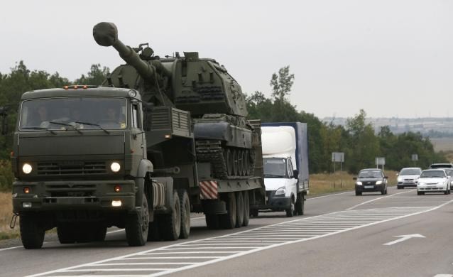 Hiện trường Donetsk hỗn loạn sau trận Kiev công kích - ảnh 14