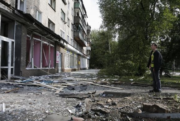 Hiện trường Donetsk hỗn loạn sau trận Kiev công kích - ảnh 6