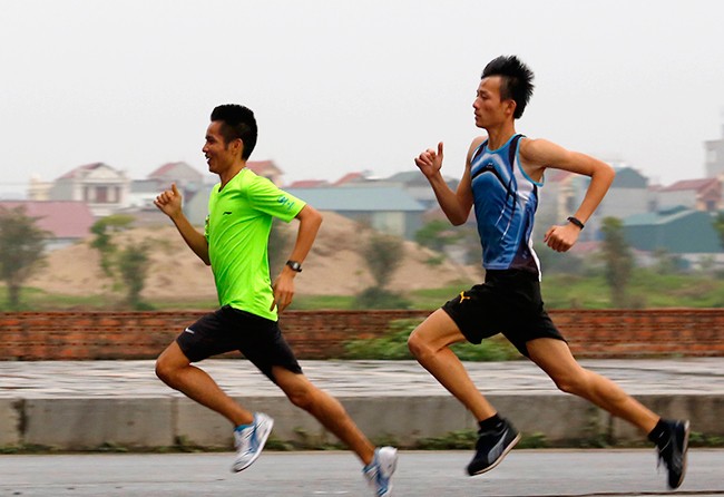 VĐV 'đội mưa' tập luyện trước ngày khởi tranh Việt dã - ảnh 12