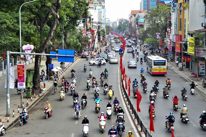 Ngày đầu đi làm sau Tết: Nơi ùn tắc, nơi thông thoáng - ảnh 11