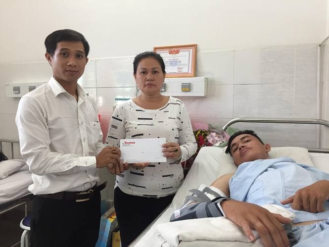 Bạn đọc báo Tiền Phong hỗ trợ 110 triệu đồng cho 5 hiệp sĩ bắt cướp - ảnh 1
