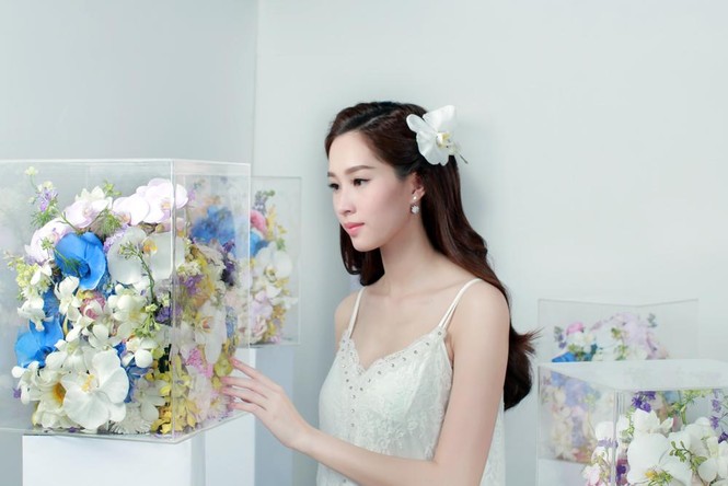Hoa hậu Thu Thảo xinh đẹp với váy kết hàng trăm hoa lan - ảnh 8