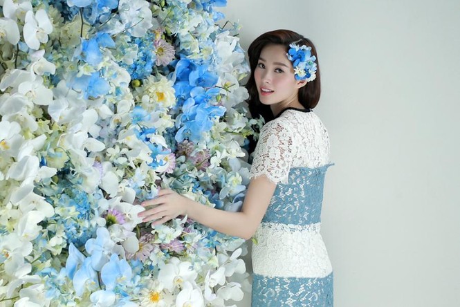 Hoa hậu Thu Thảo xinh đẹp với váy kết hàng trăm hoa lan - ảnh 12