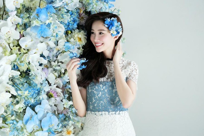 Hoa hậu Thu Thảo xinh đẹp với váy kết hàng trăm hoa lan - ảnh 11