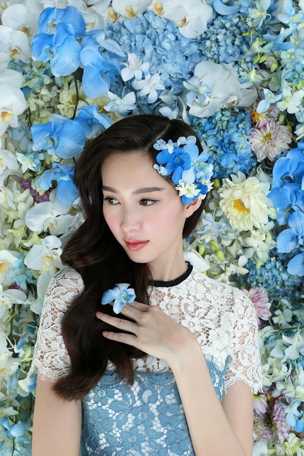 Hoa hậu Thu Thảo xinh đẹp với váy kết hàng trăm hoa lan - ảnh 10