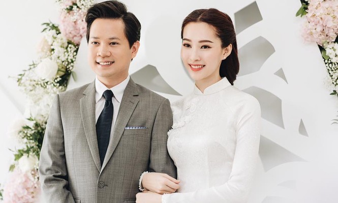 Hoa hậu Thu Thảo mặc áo dài trắng giản dị trong lễ đính hôn - ảnh 3