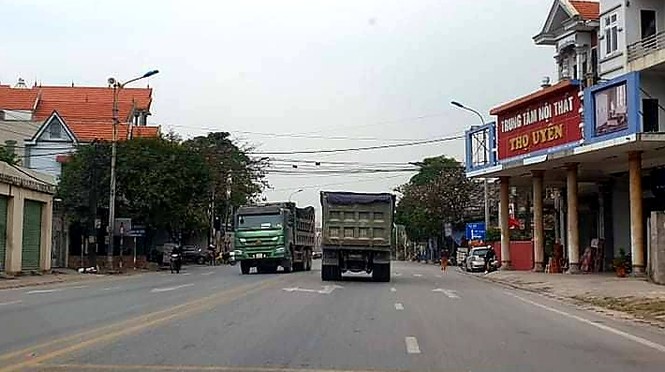 Xe quá tải lộng hành trên quốc lộ 18 - ảnh 2