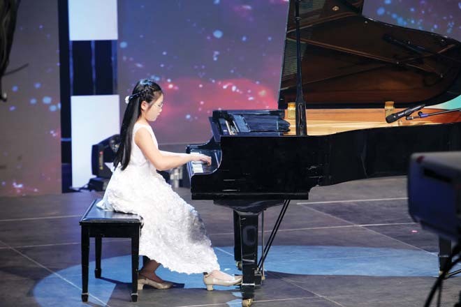 Cô bé piano - ảnh 1