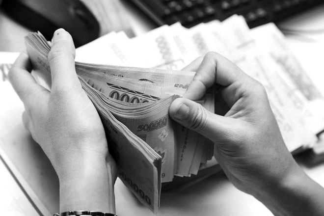 VND sẽ mất giá 3% trong 2018? - ảnh 1