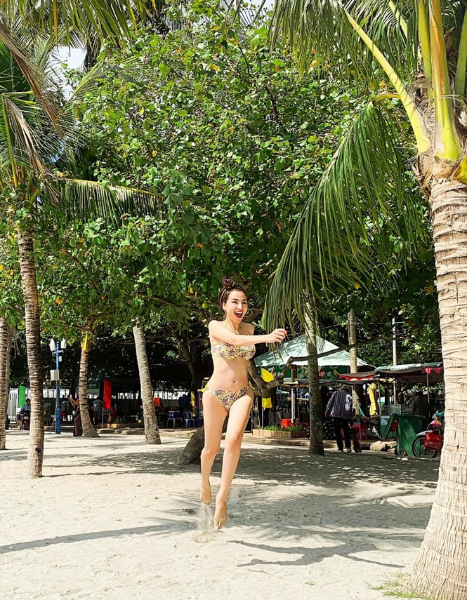 Hoa hậu Diễm Hương tung loạt ảnh bikini đốt mắt khán giả - ảnh 4 Hoa hậu Diễm Hương tung loạt ảnh bikini đốt mắt khán giả - ảnh 4