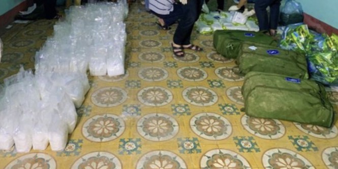 Xác định danh tính 2 nghi phạm bỏ xe ô tô và gần 2,5 tạ ma tuý trốn vào rừng - ảnh 2