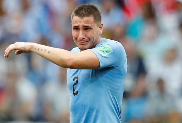Chùm ảnh cầu thủ Uruguay rơi lệ sau thất bại trước tuyển Pháp - ảnh 24