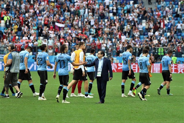 Chùm ảnh cầu thủ Uruguay rơi lệ sau thất bại trước tuyển Pháp - ảnh 20