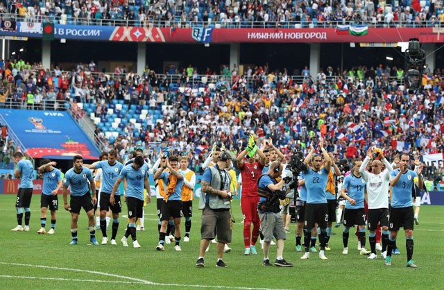 Chùm ảnh cầu thủ Uruguay rơi lệ sau thất bại trước tuyển Pháp - ảnh 19